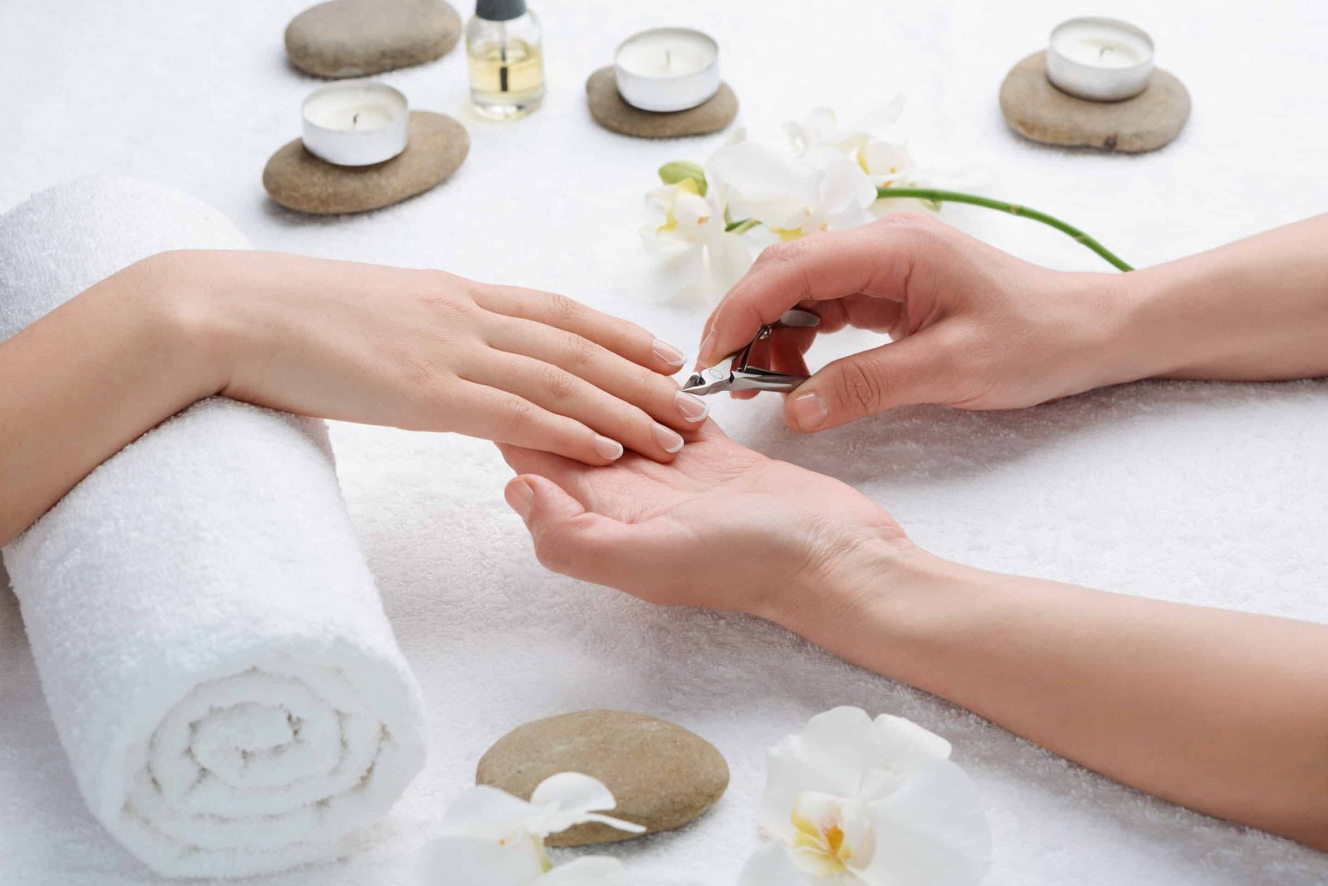 Beautician,Removing,Cuticle,With,Nippers.,Treatment,And,Care,For,Hands manicure on right hand