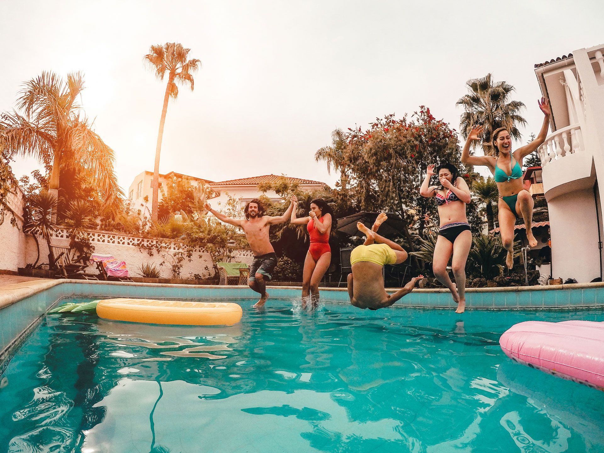 Happy People Jumping On Pool — Townsville, QLD — Pinnacle Pools NQ Happy People Jumping On Pool — Townsville, QLD — Pinnacle Pools NQ