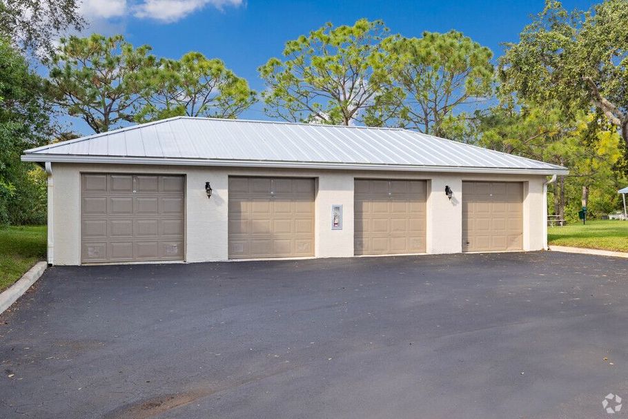 Detachable 1 car garages located throughout the property. 