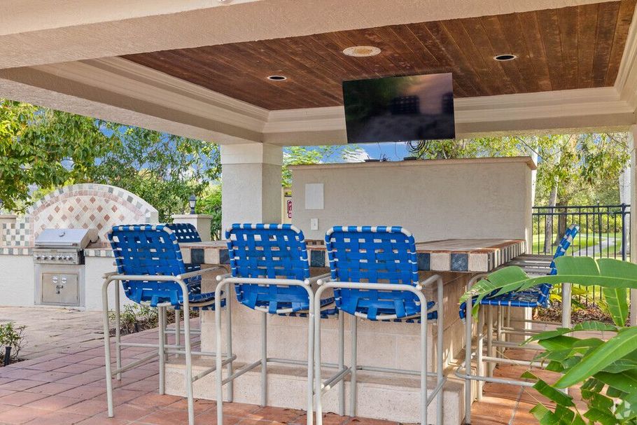 Unwind in our stunning cabana area. Enjoy bar seating or catch the game on the outdoor TV