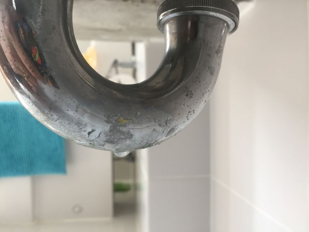 A Close Up Of A Drain Pipe In A Bathroom — Coastal Gasfitting & Plumbing In Bushland Beach, QLD