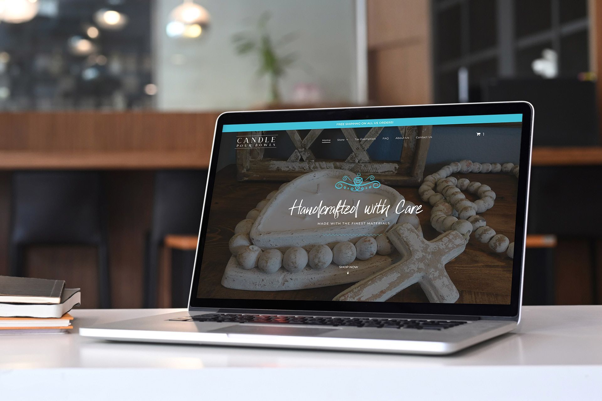 A laptop is open to a website with a picture of a starfish on the screen