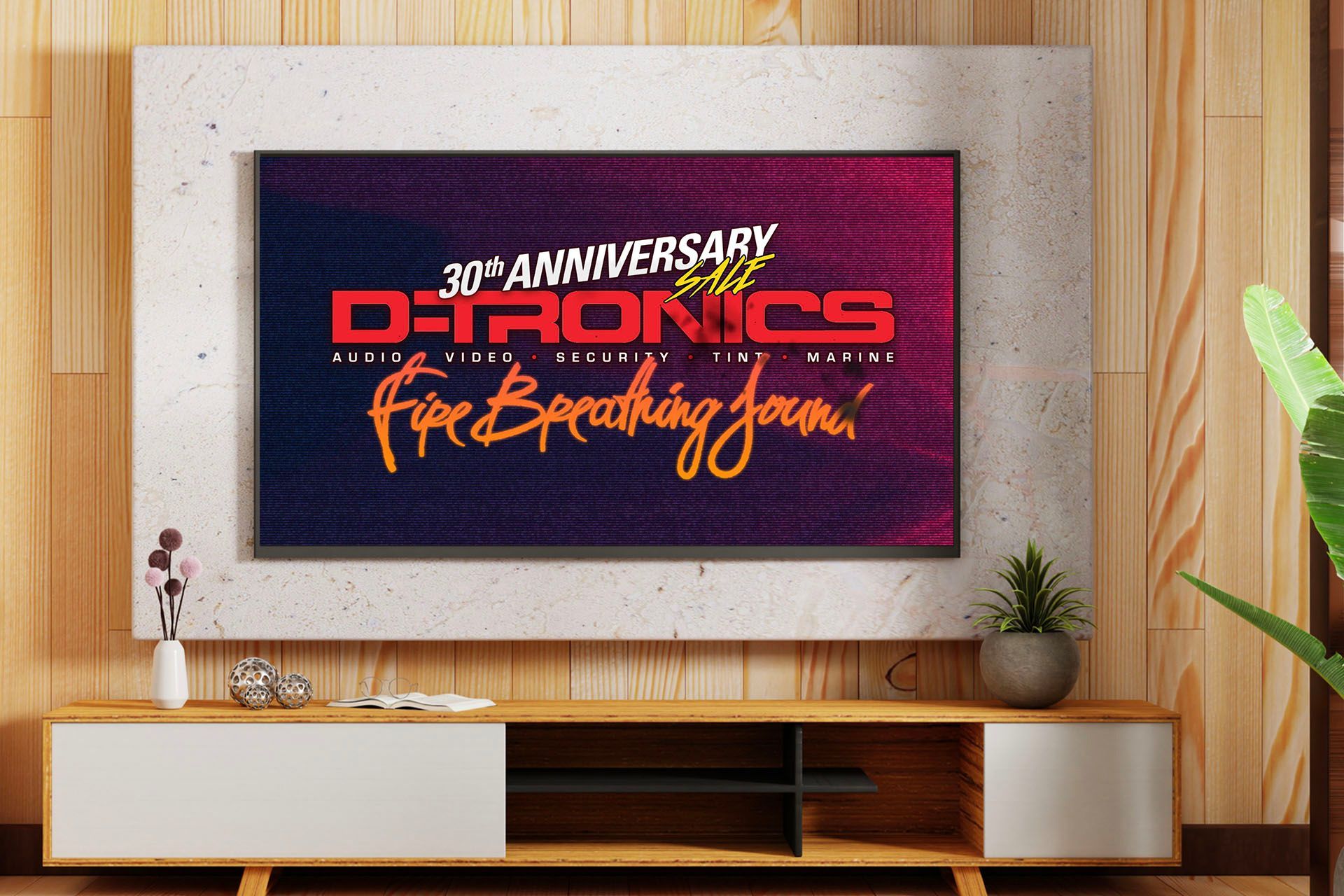 A living room with a tv on the wall that says o-tronics