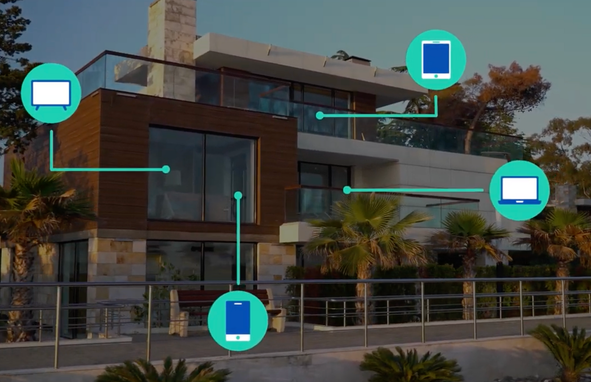 A house with a lot of windows and a lot of electronics connected to it.