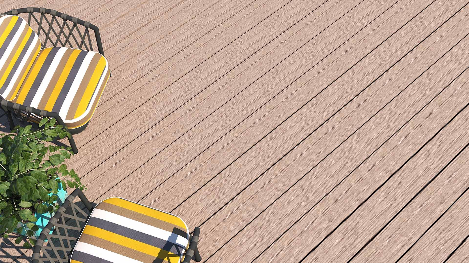 Two chairs with yellow and gray striped cushions are placed on a light wood deck
