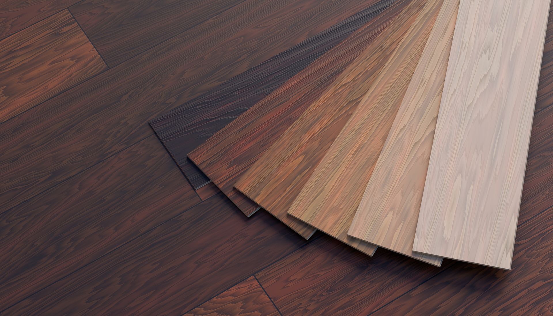 Wood flooring color samples showing light to dark hardwood planks laid over a rich brown floor grain.