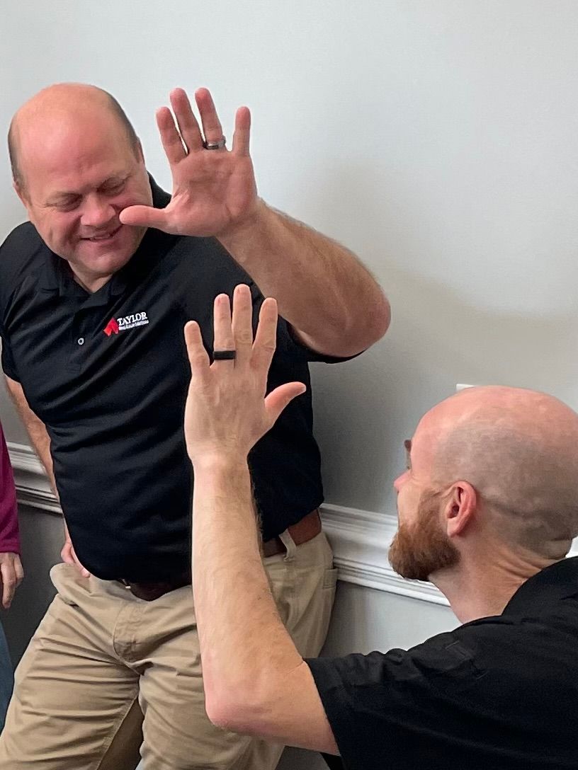 coworkers high five
