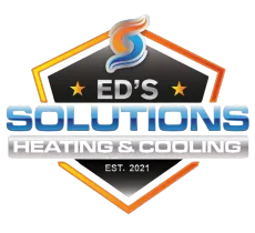 Ed's Solutions Heating & Cooling logo with orange, blue, and silver shield design, est. 2021