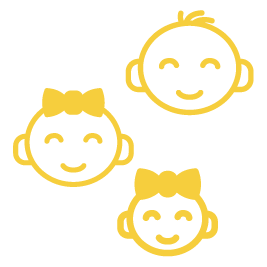 Three children , a boy and two girls , are smiling.