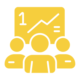 A group of people standing in front of a board with a graph on it.