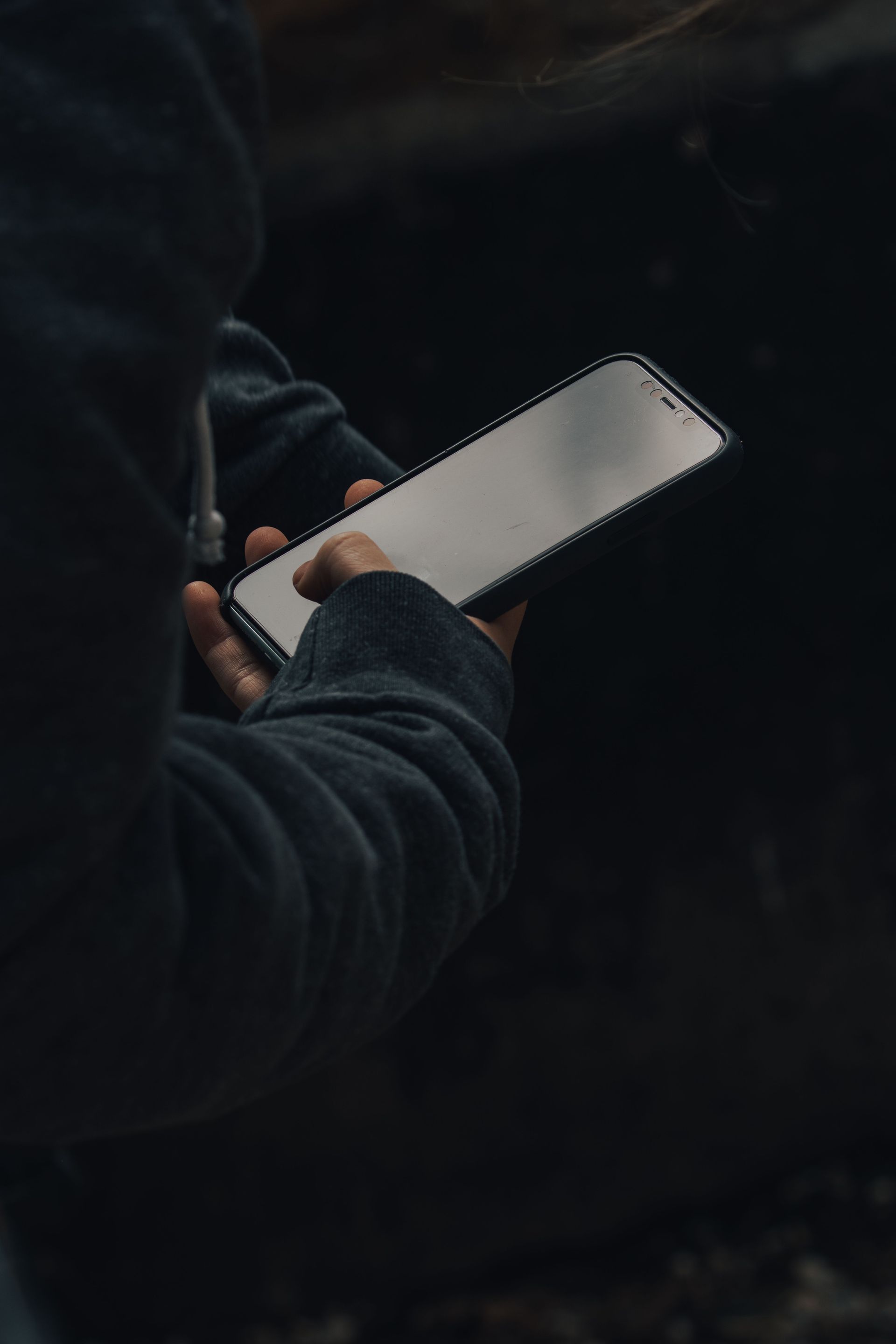 a person holding a cell phone