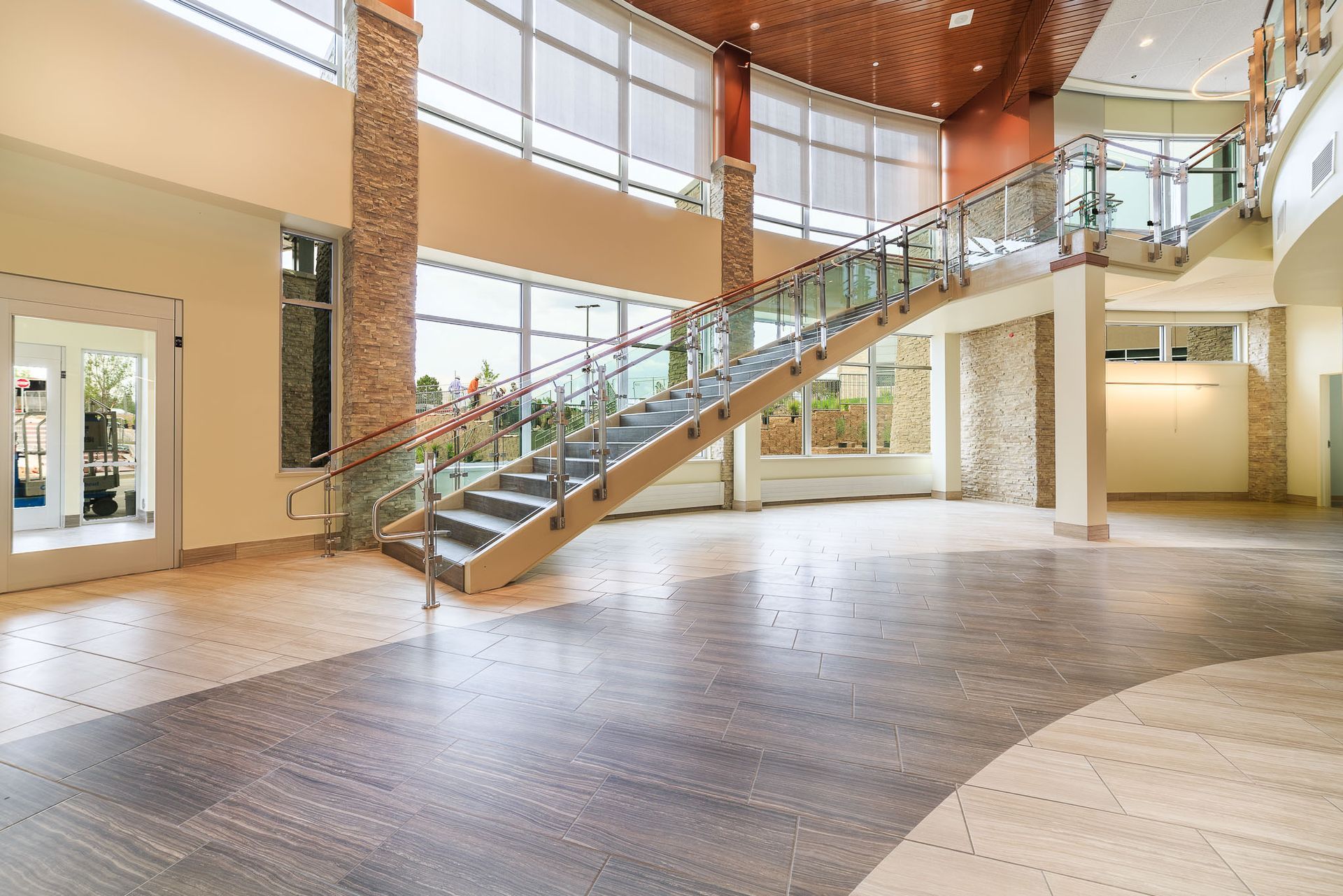 a large building with a lot of windows  installed by Sun Glass Montrose