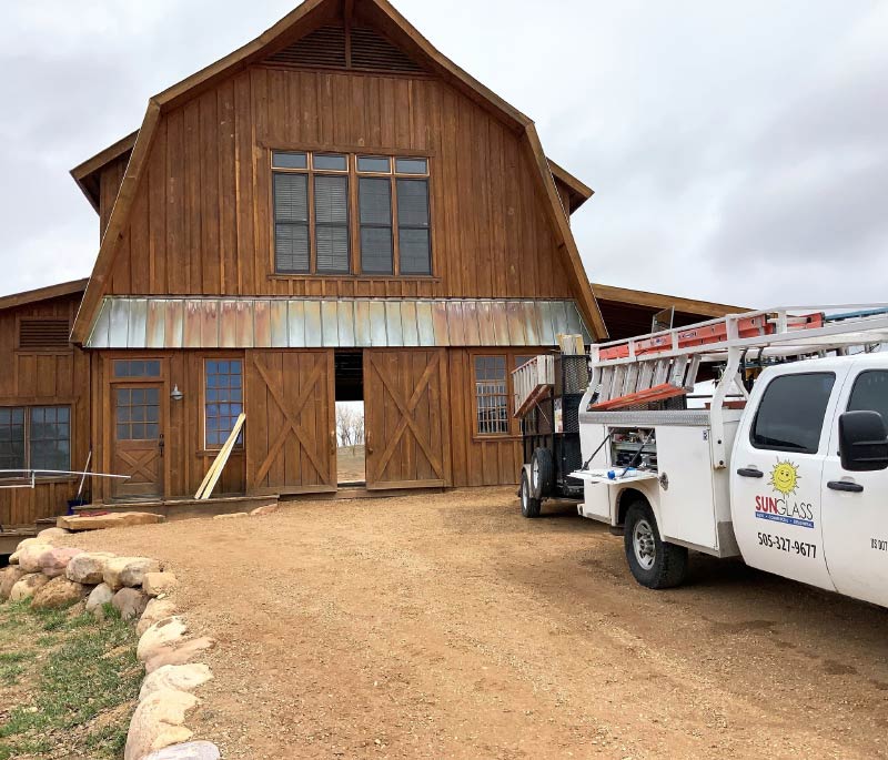 a barn with windows installed by Sun Glass 