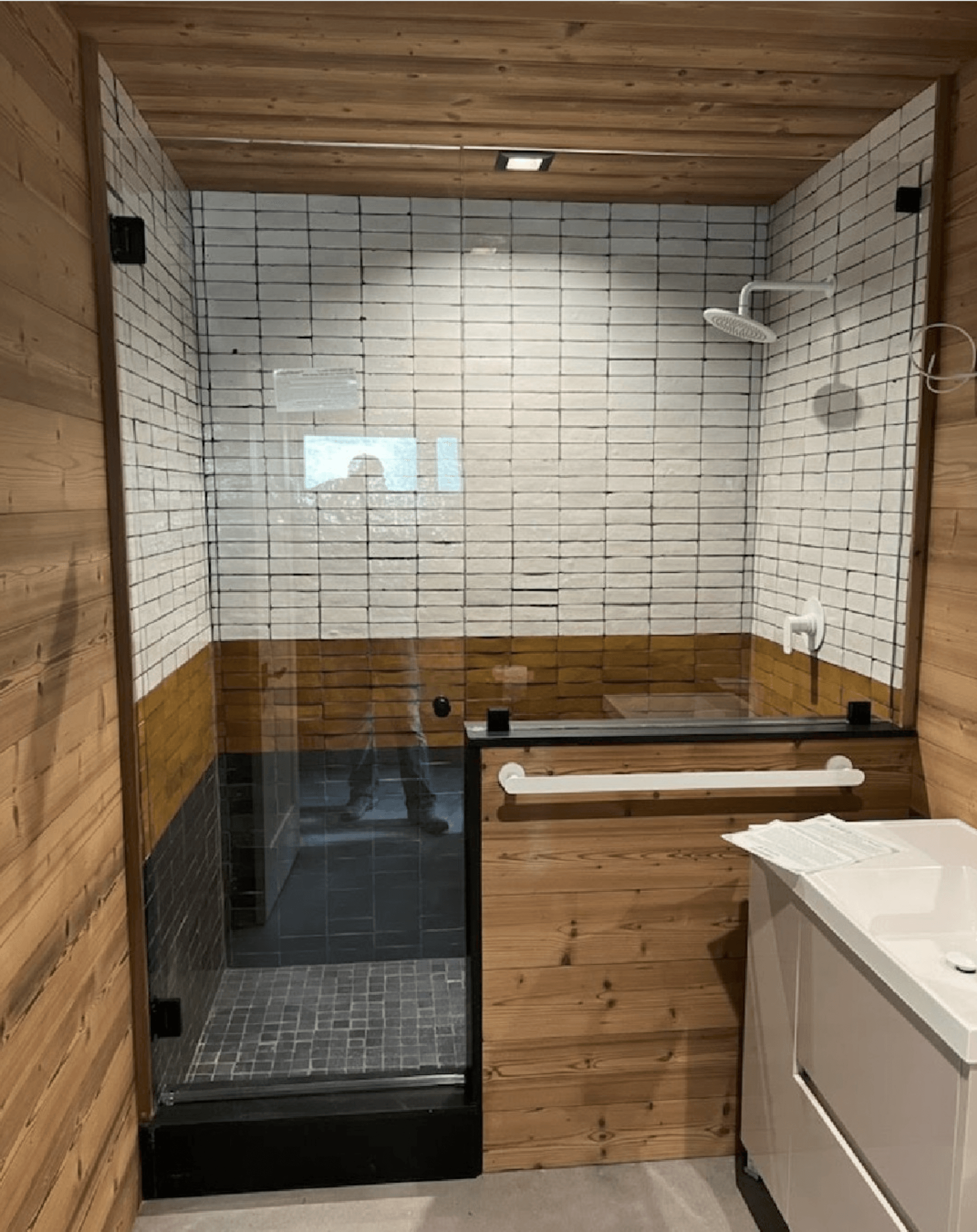 a picture of a shower glass by Sun Glass