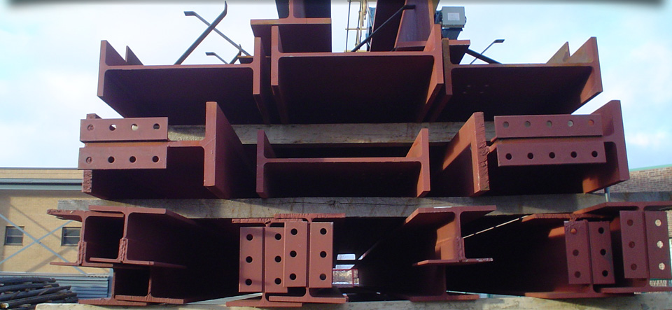 A bunch of rusty metal pieces stacked on top of each other