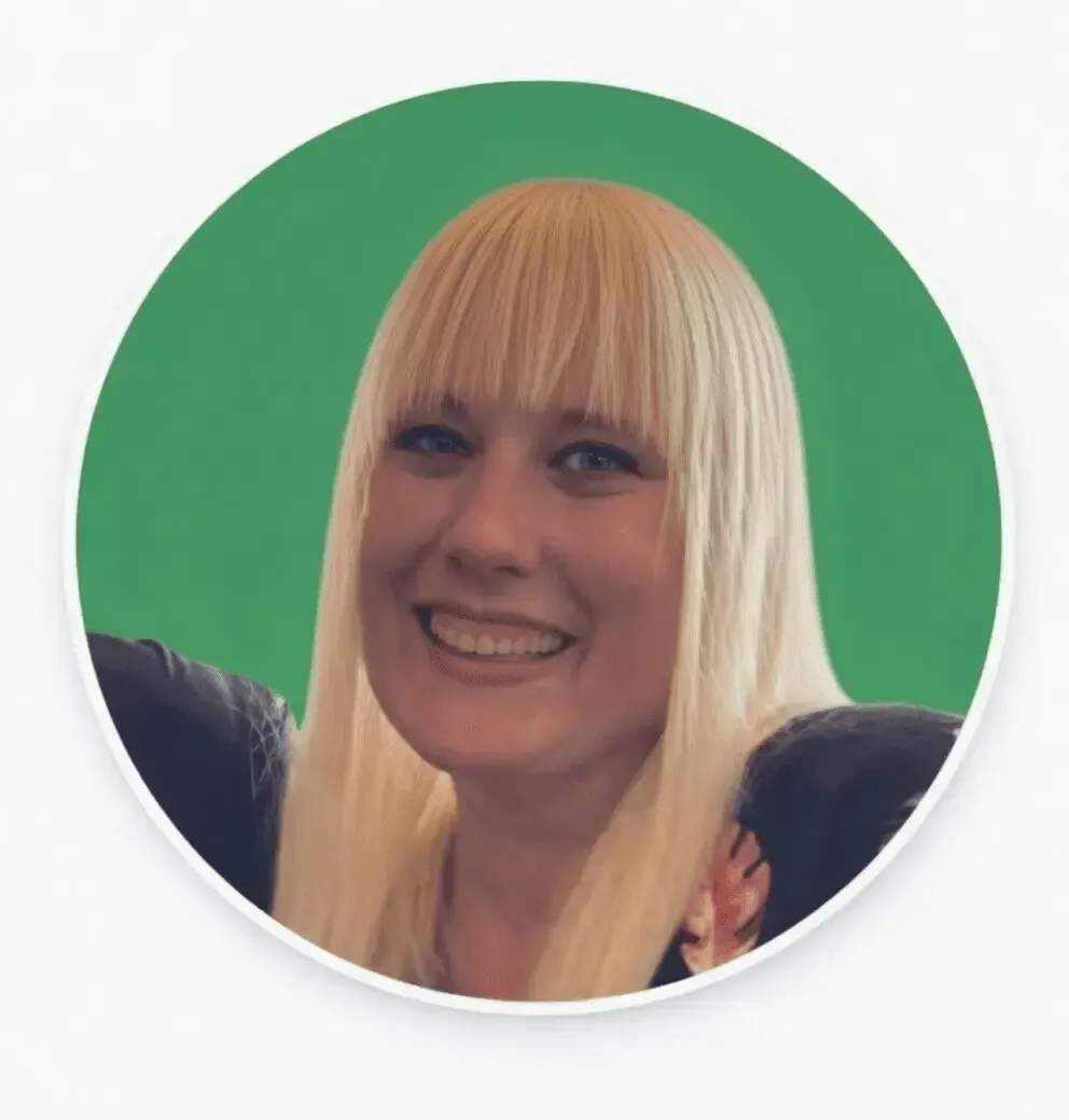 Smiling blonde family assessment centre team member with bangs