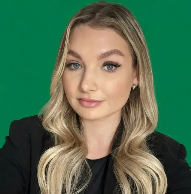 Meet our family assessment centre team member with wavy blonde hair and black blazer