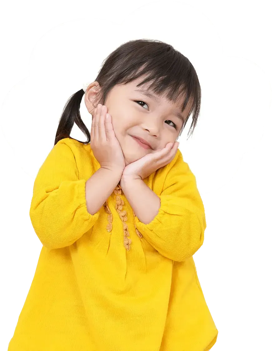 Smiling young child with hands on cheeks in yellow sweater for children’s assessment centre