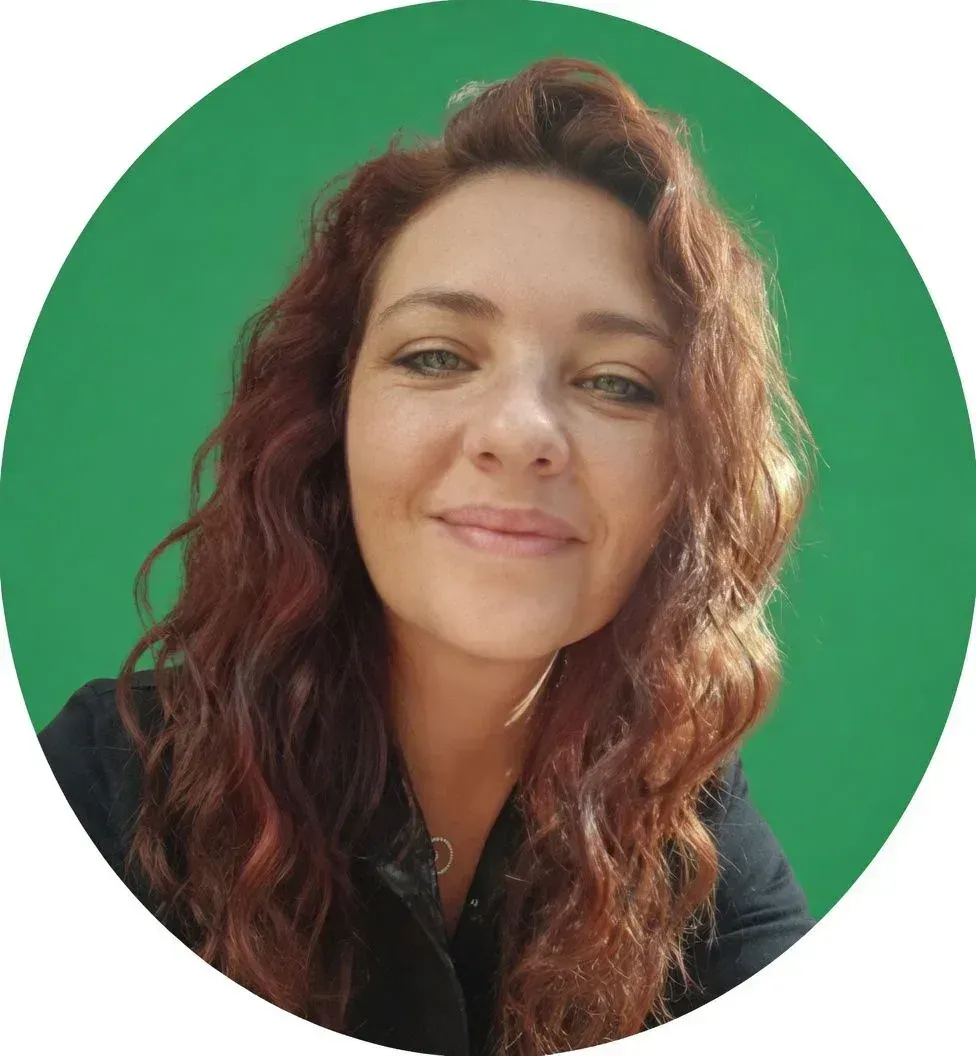 Family assessment centre team member portrait with green background