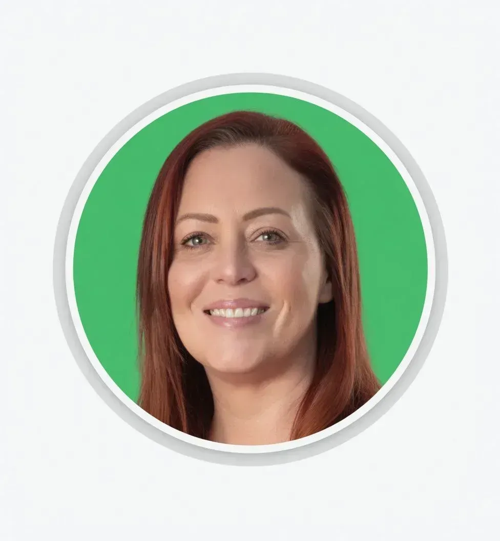 Smiling auburn-haired family assessment centre team member portrait