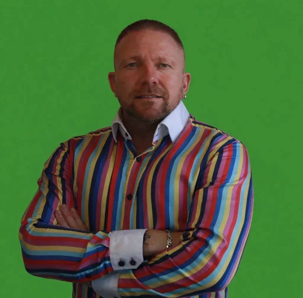 Smiling family assessment centre team member in a blue blazer and white shirt