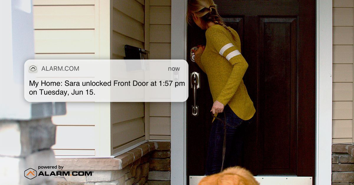 Woman Unlocking Her Door with a Phone Notification