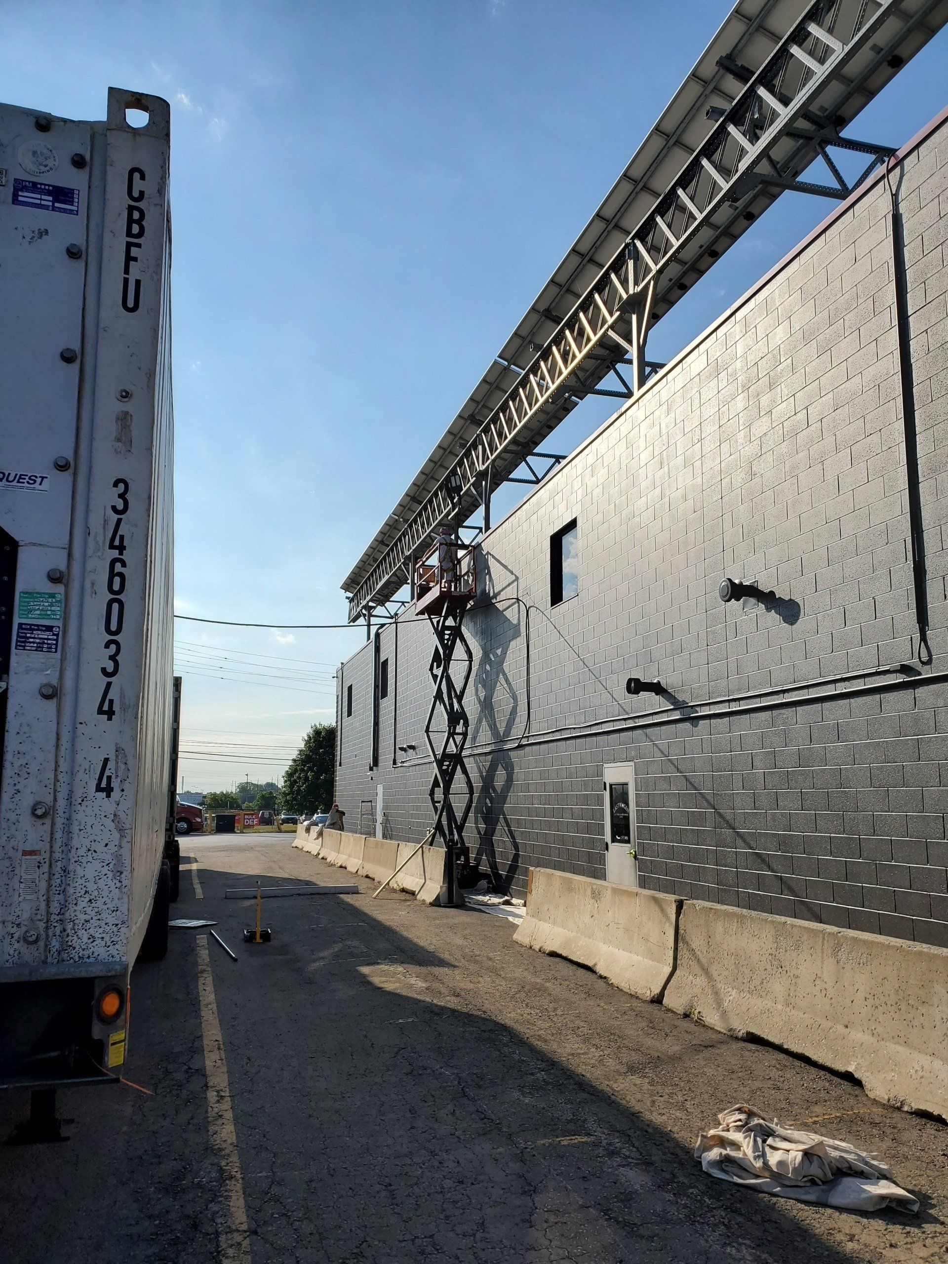 Hamilton’s Trusted Commercial Painters; Image of commercial business getting painted by Peninsula Painting 