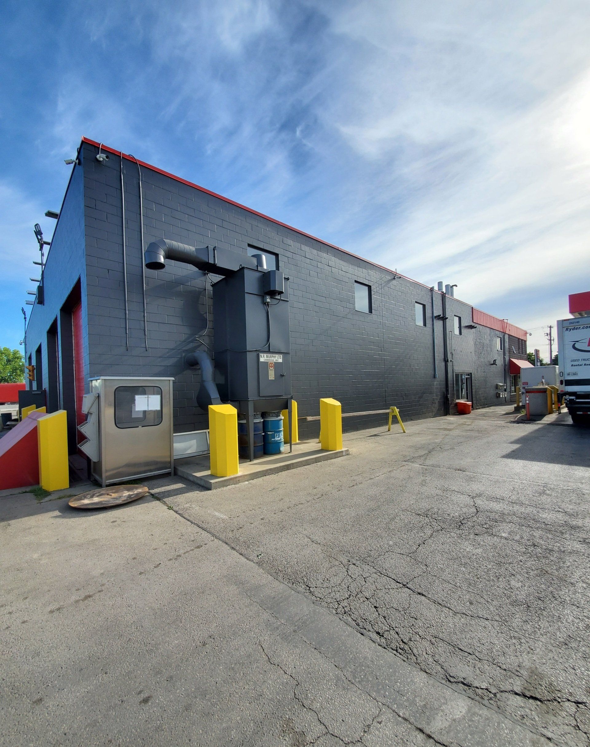 Hamilton’s Trusted Commercial Painters; Image of commercial business getting painted by Peninsula Painting 