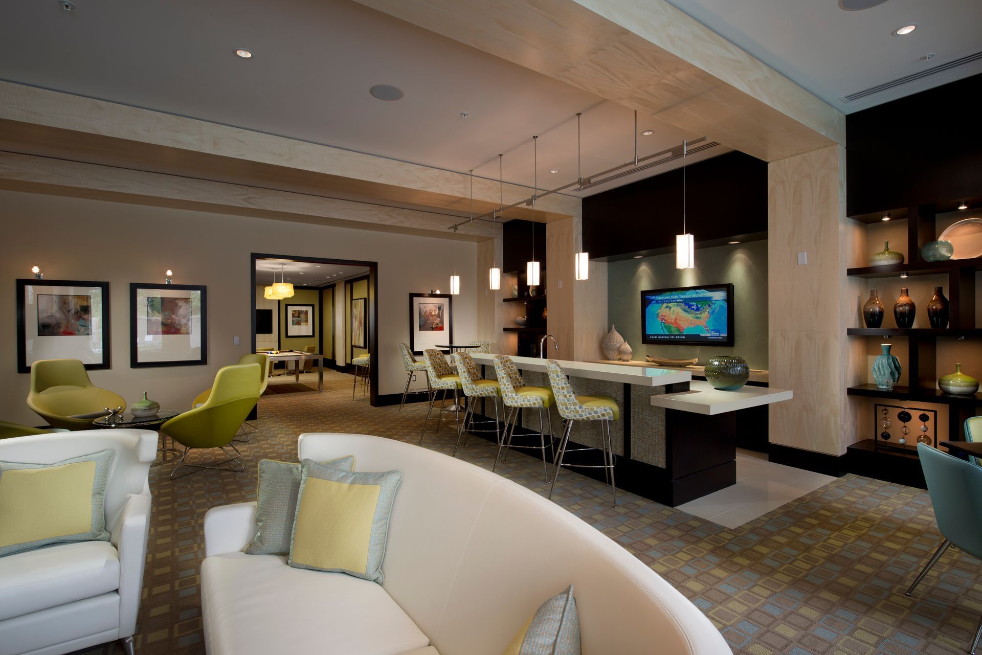 A living room filled with furniture and a television