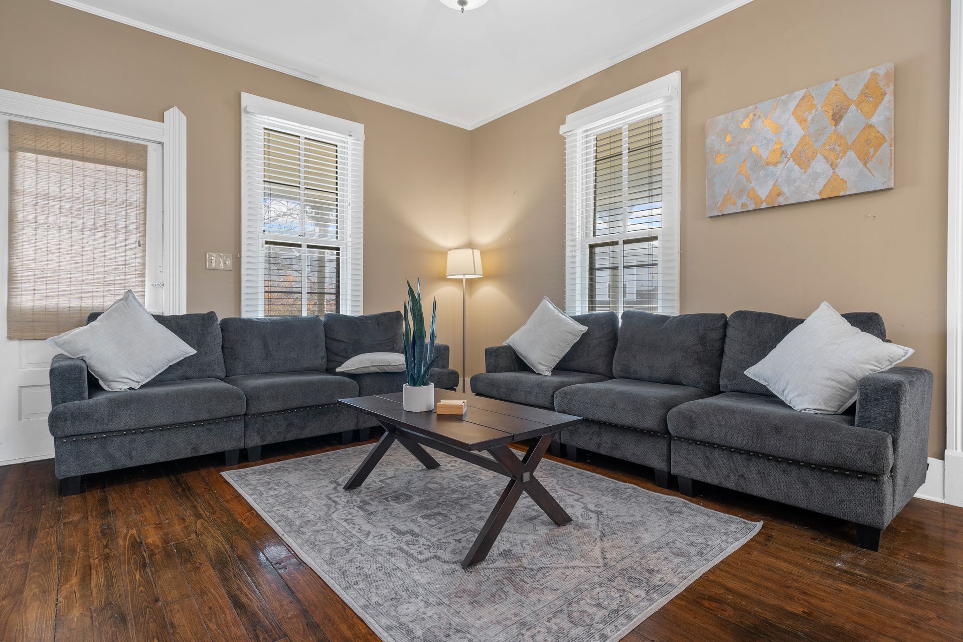 A living room with two couches and a coffee table.