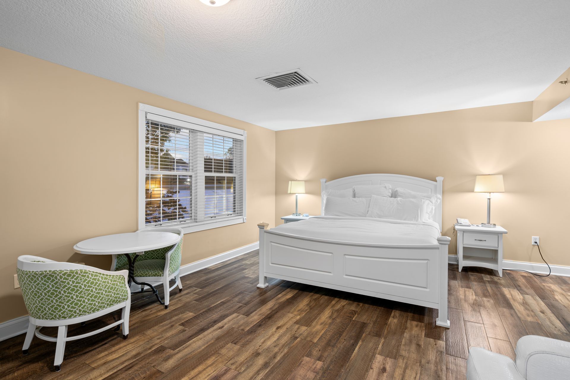 There is a large bed in the middle of the room.