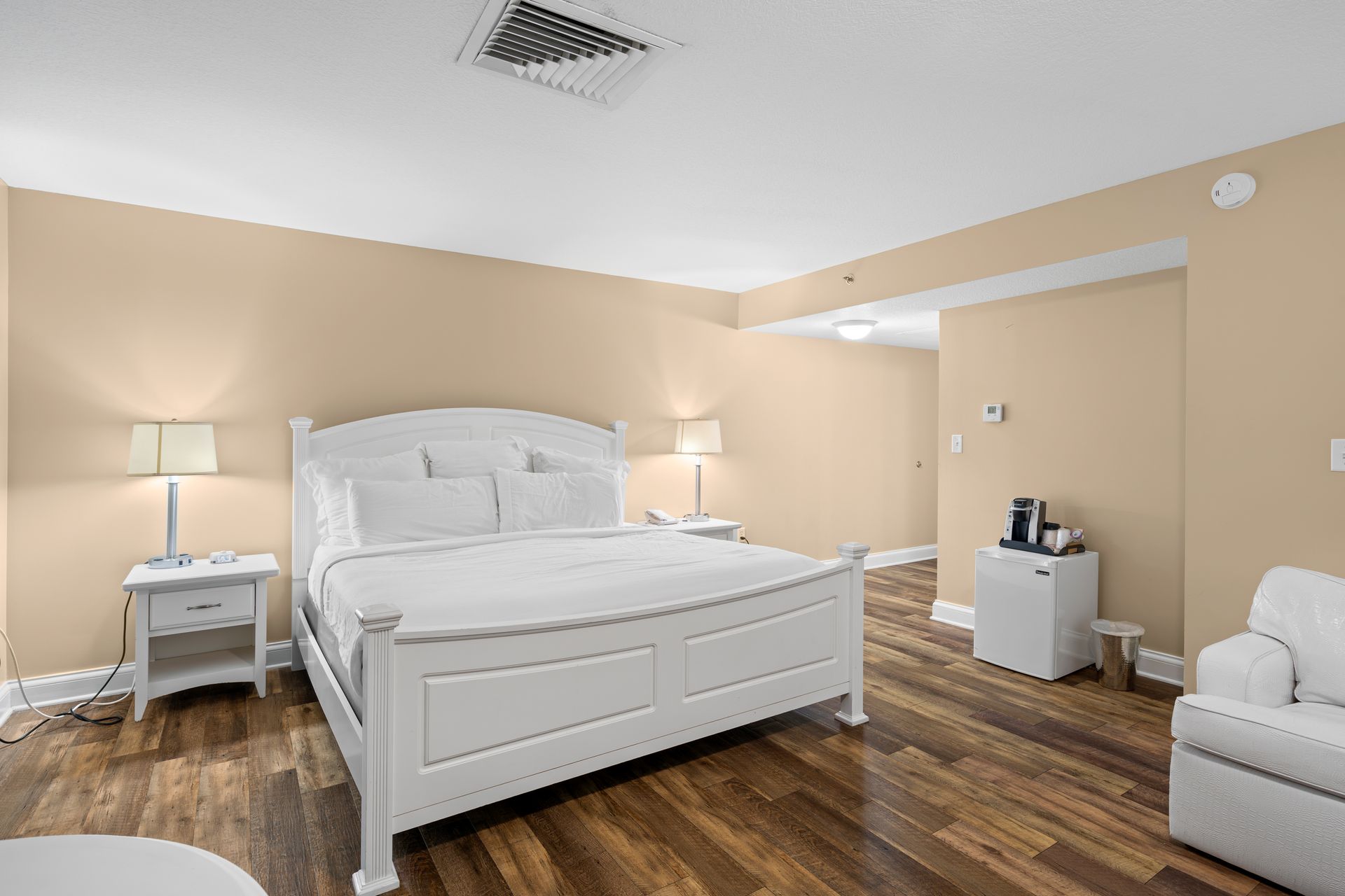 There is a large bed in the middle of the room.