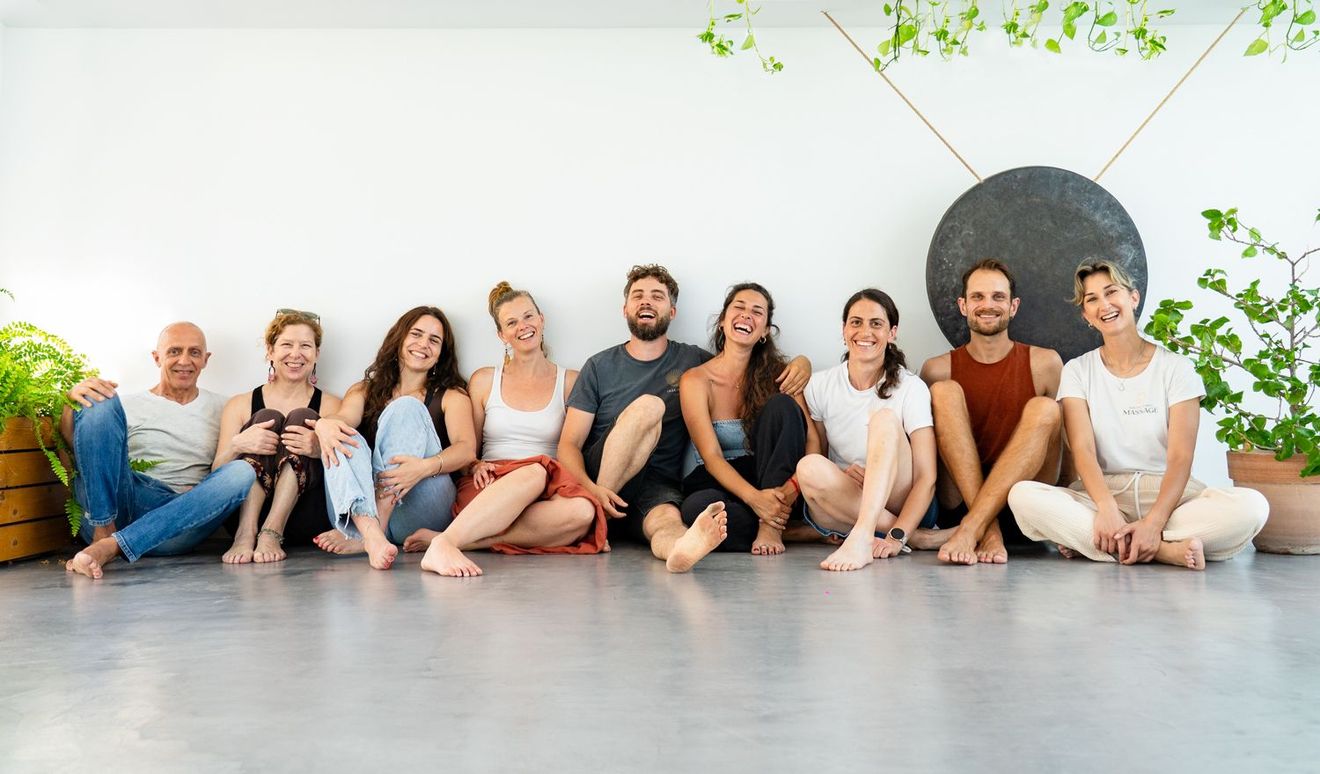 INEA Yoga teachers and team seated together at the Corfu retreat centre