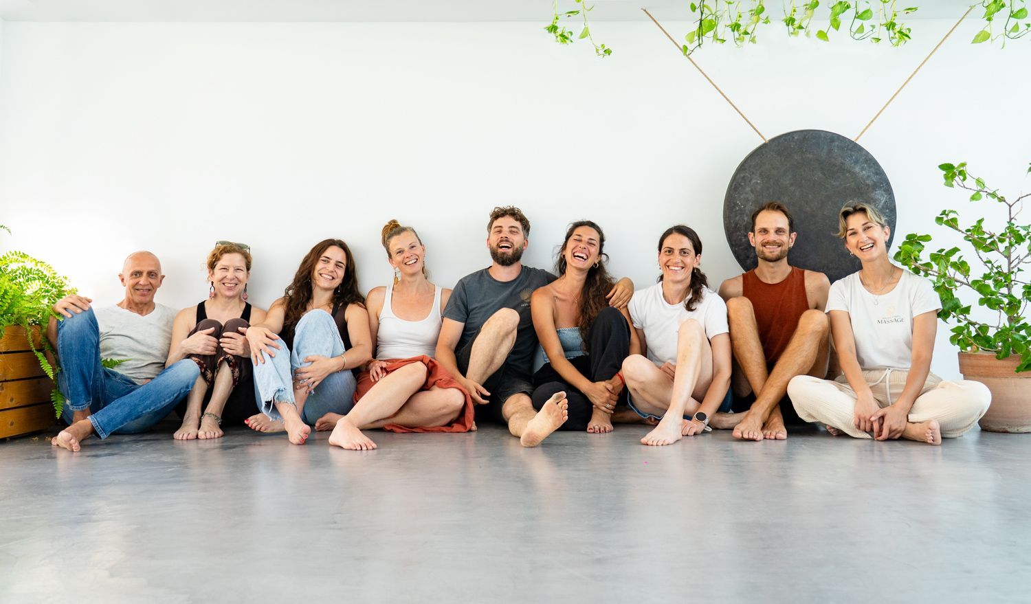 INEA Yoga teachers and team seated together at the Corfu retreat centre