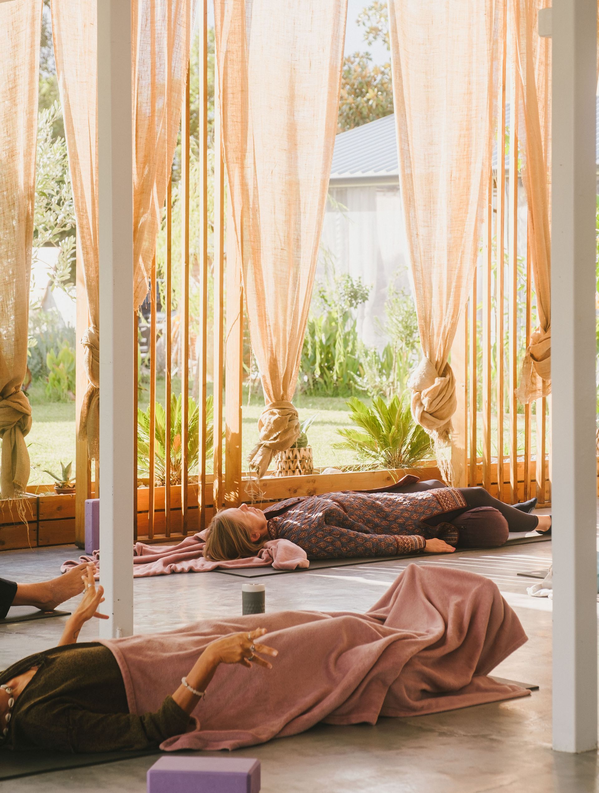 Sunlit yoga training space at a retreat center in Corfu, Greece