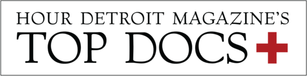 Hour Detroit Magazine’s Top Docs logo with a red cross symbol