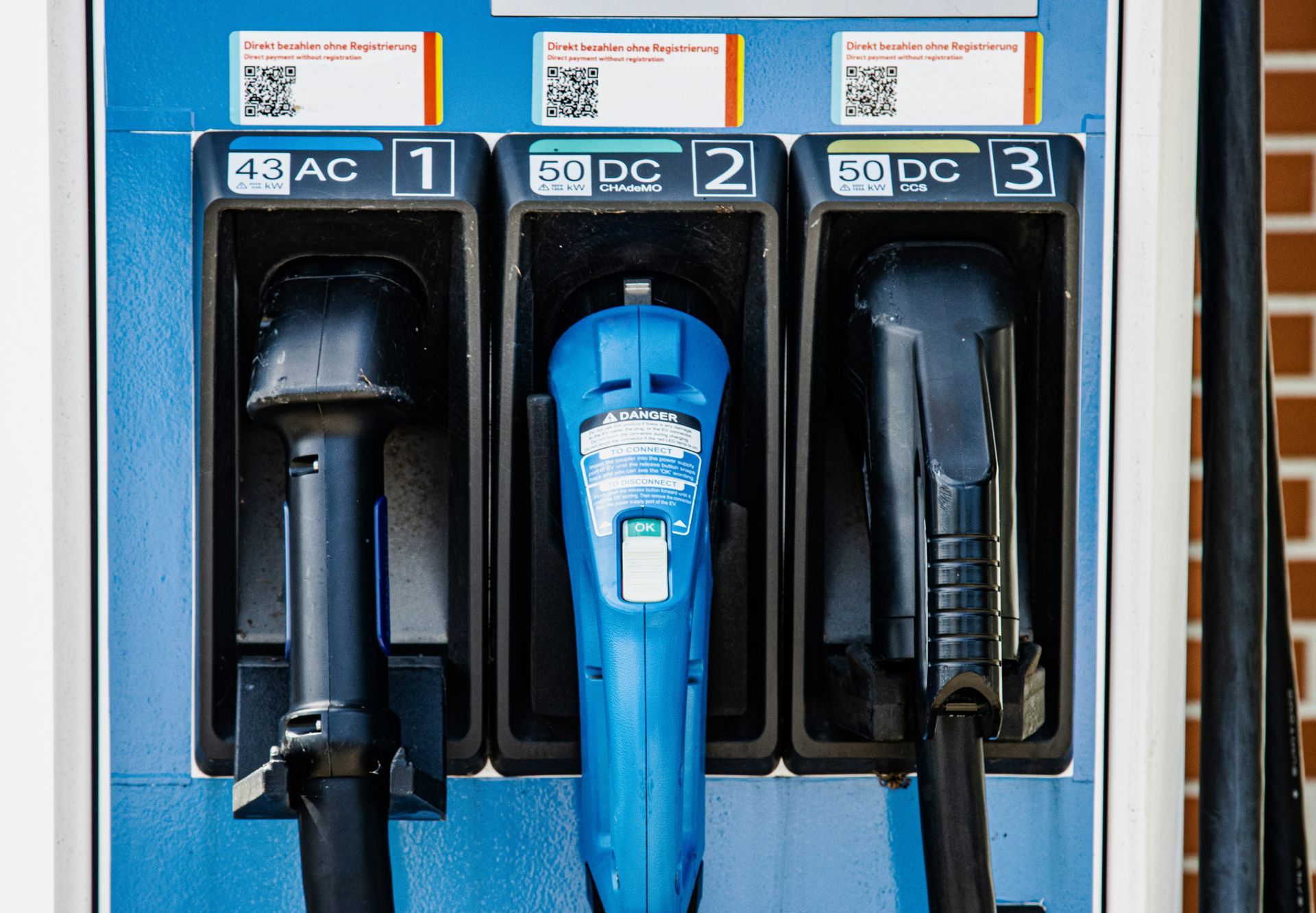 Three EV charger plug, first for AC charging, middle for CHAdeMO DC charging, right for  CCS2 DC charging