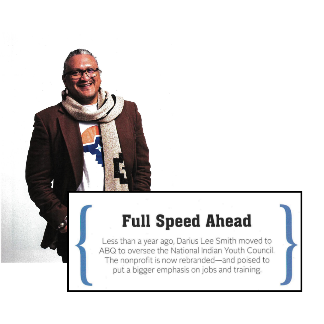 A man holding a sign that says full speed ahead