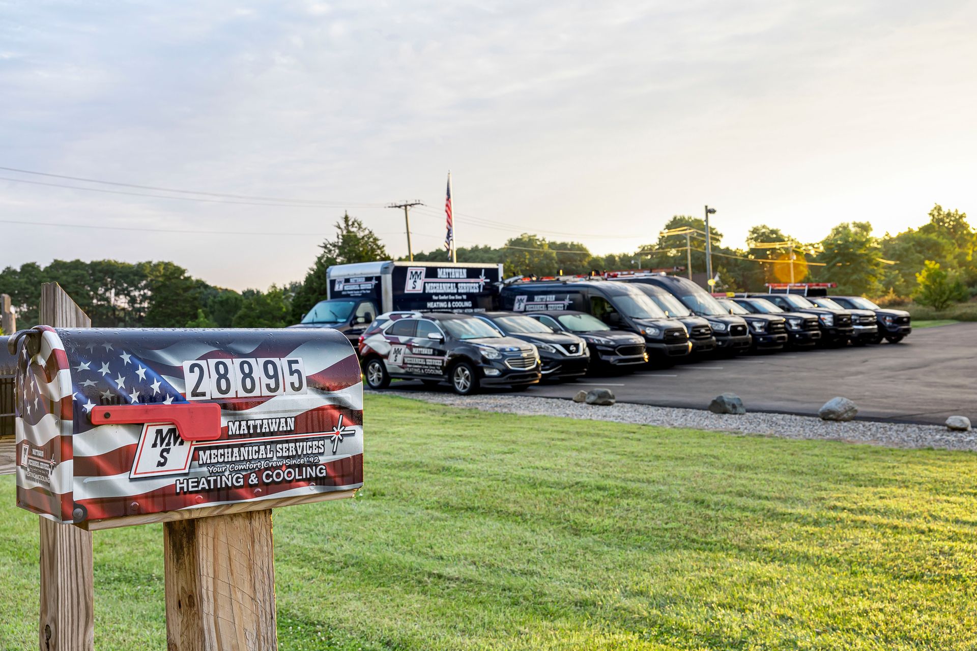 A mailbox has a picture of an american flag on it