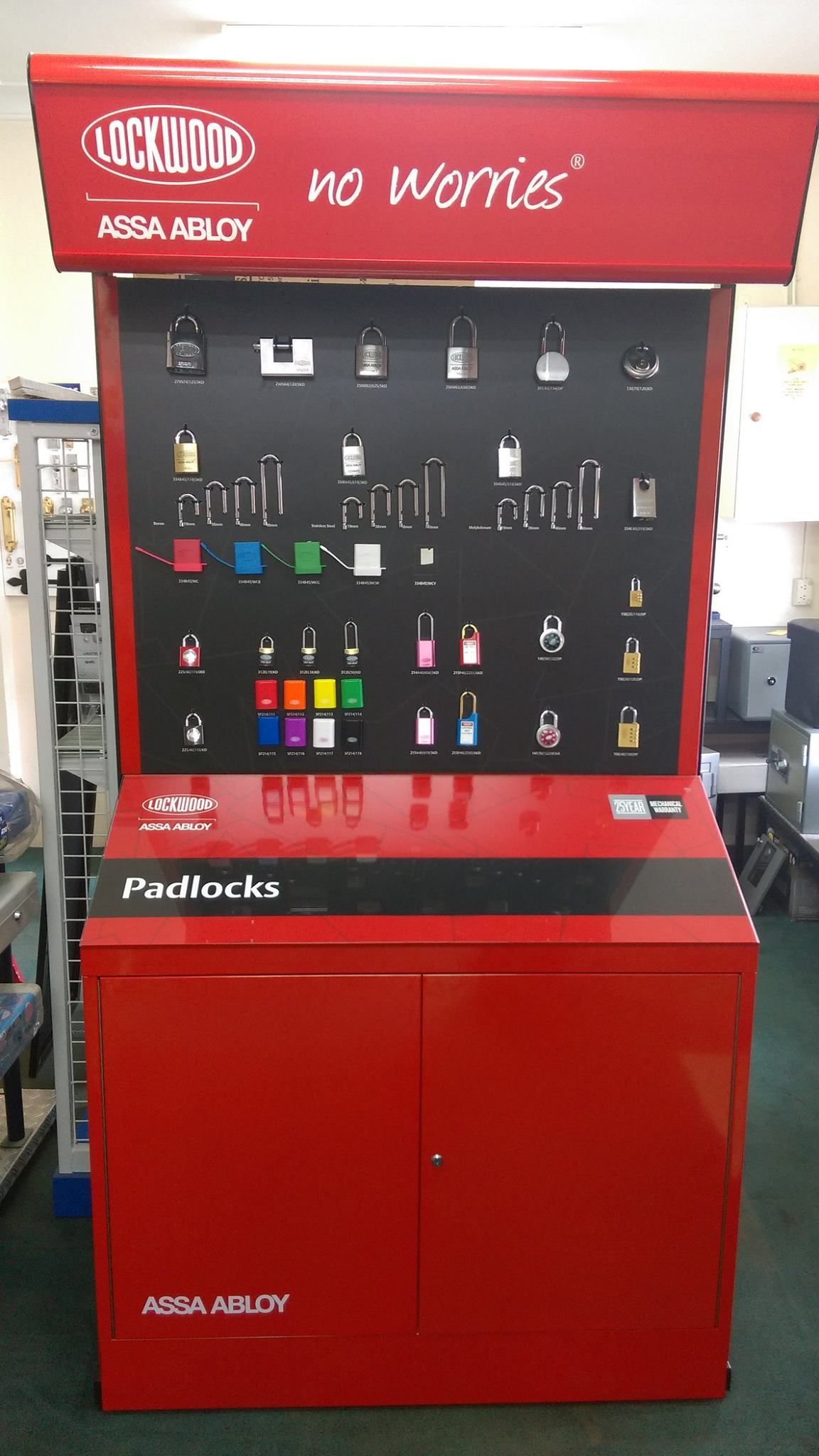 A Red and Black Display of Padlocks in a Store — ADC Locksmiths in Wollongong, NSW 