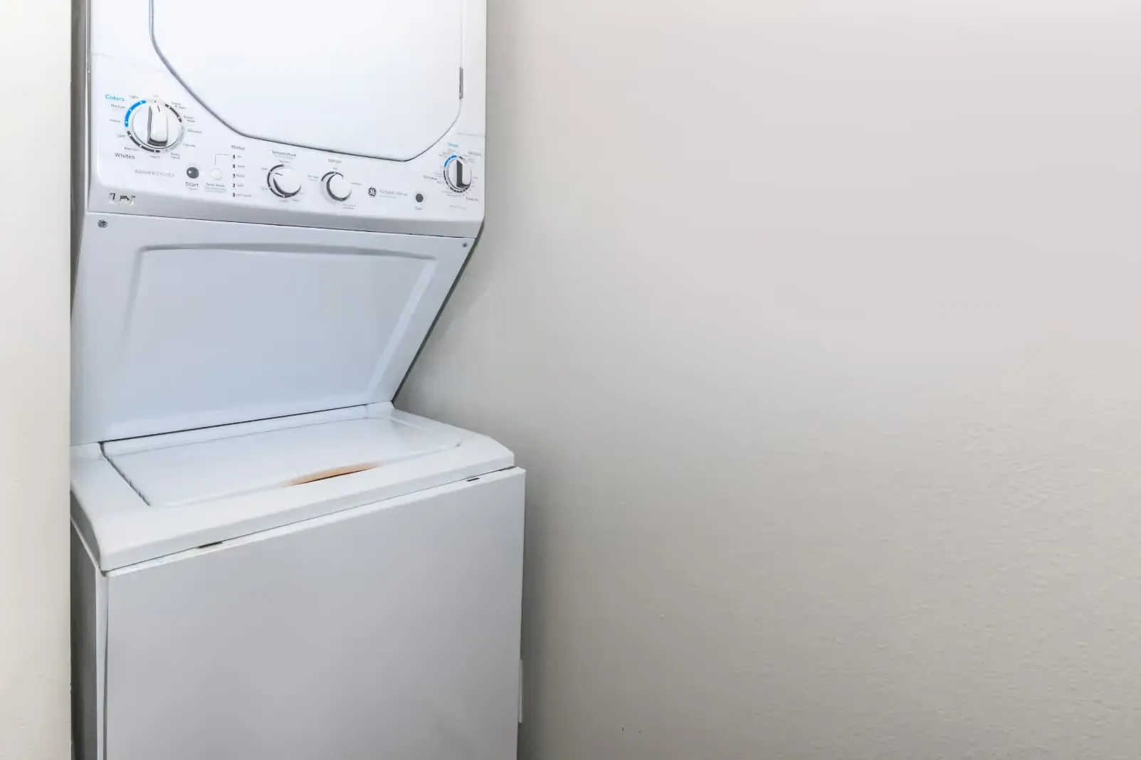 Stacked washer and dryer unit.