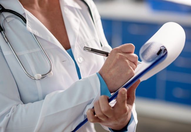 Doctor Writing Down Notes — Gulf Shores, AL — Jeanne Birkenhauer, MD, PC