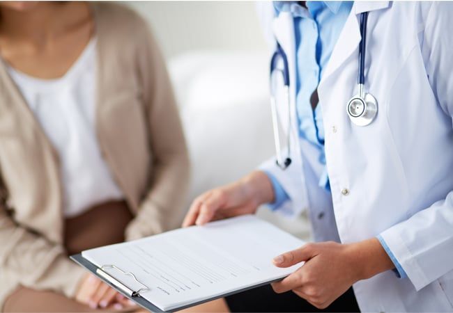 Doctor Checking A Patient — Gulf Shores, AL — Jeanne Birkenhauer, MD, PC Doctor Checking A Patient — Gulf Shores, AL — Jeanne Birkenhauer, MD, PC