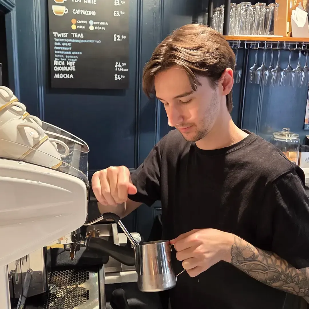 Howard makes a barista coffee at French & Day Delicatessen