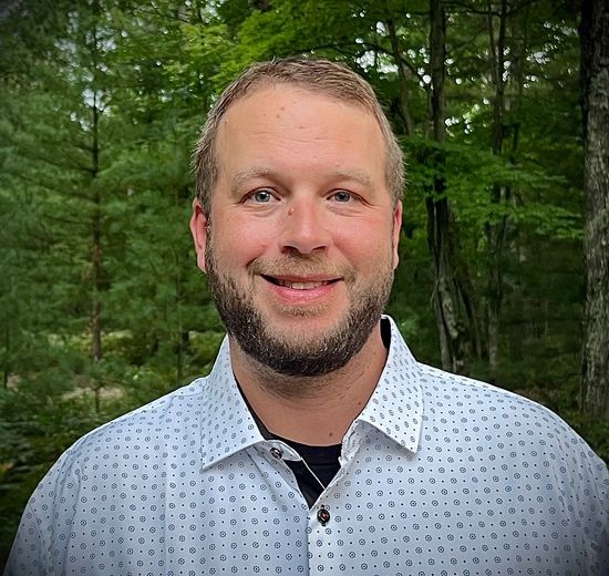 A man Ryan Buzelli being a Realtor