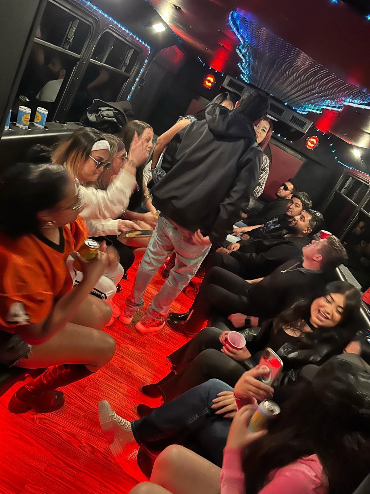 Customers enjoying a celebration inside the party bus