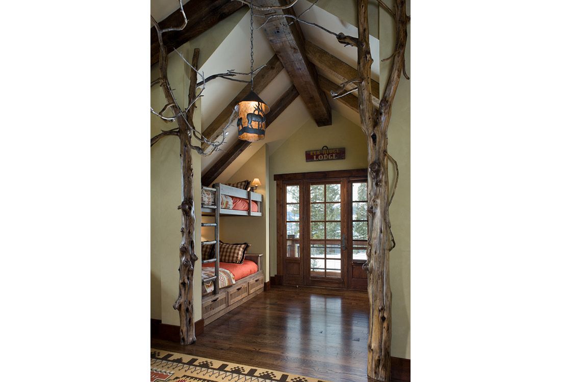 A hallway with a tree in the middle of it