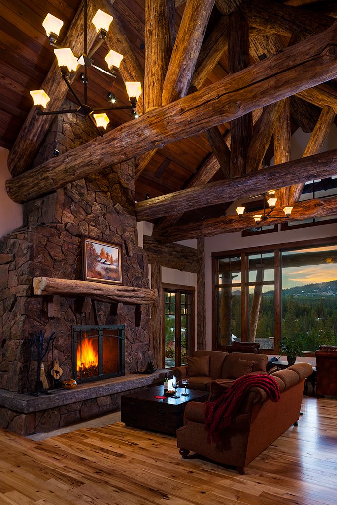 A living room with a fireplace and a couch