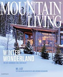 A mountain living magazine with a house on the cover