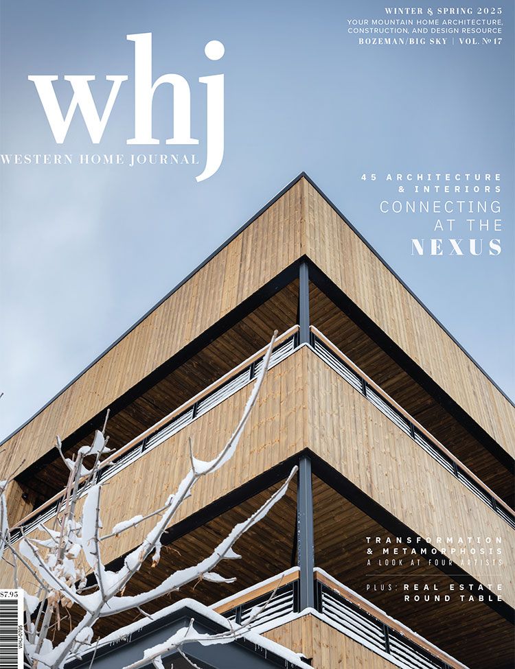 The cover of a magazine with a wooden building on it